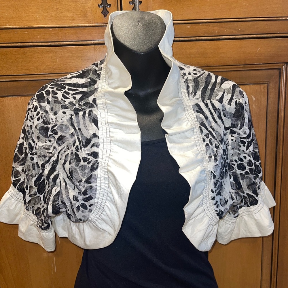 Black and white animal print ruffle bolero jacket
